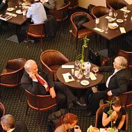 Г.Шмаль - президент Союза нефтегазопромышленников (за столиком, в центре), С. Каморников - зам гендиректора Белоруснефть (крайний слева)